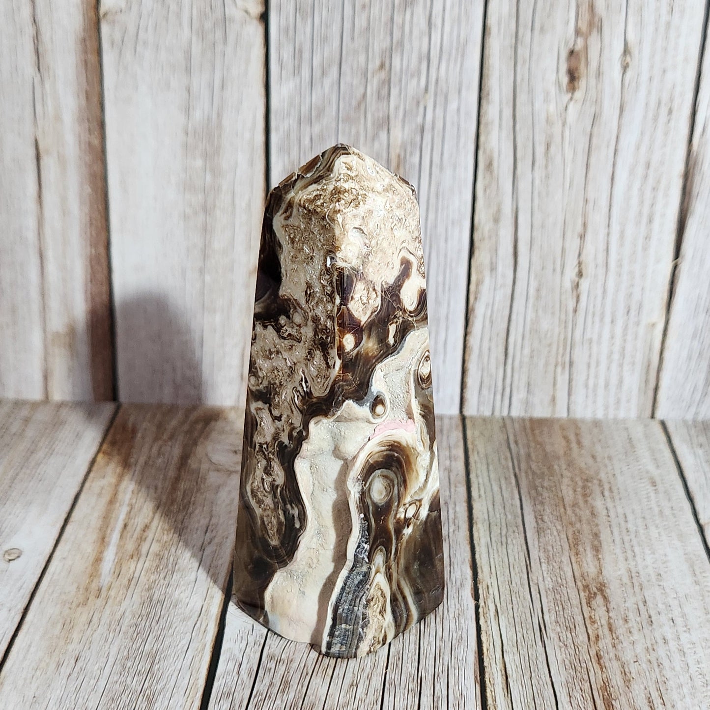 Decorative stone on a wooden surface