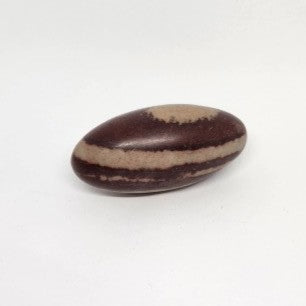 Brown and beige stone on a white background