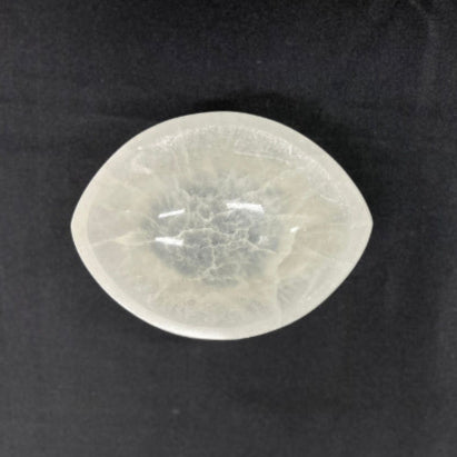 Clear stone with cracks on a black background