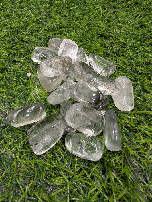 Clear crystal stones on green grass