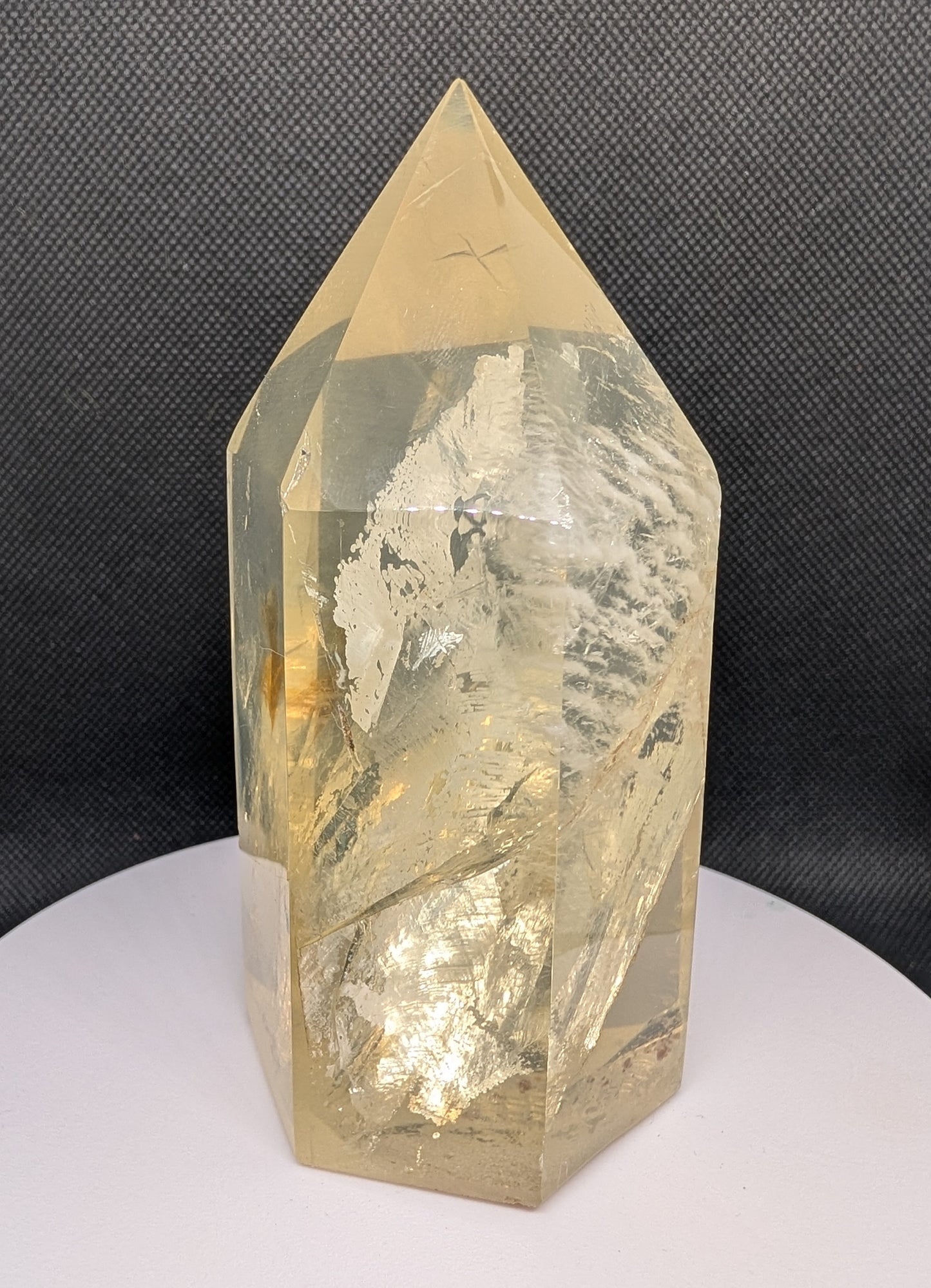 Crystal tower with natural rock formation on a dark background