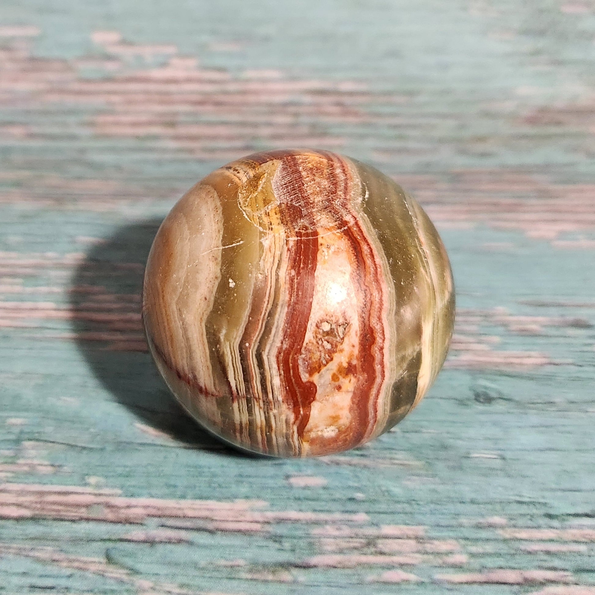 Marbled stone on a textured blue surface