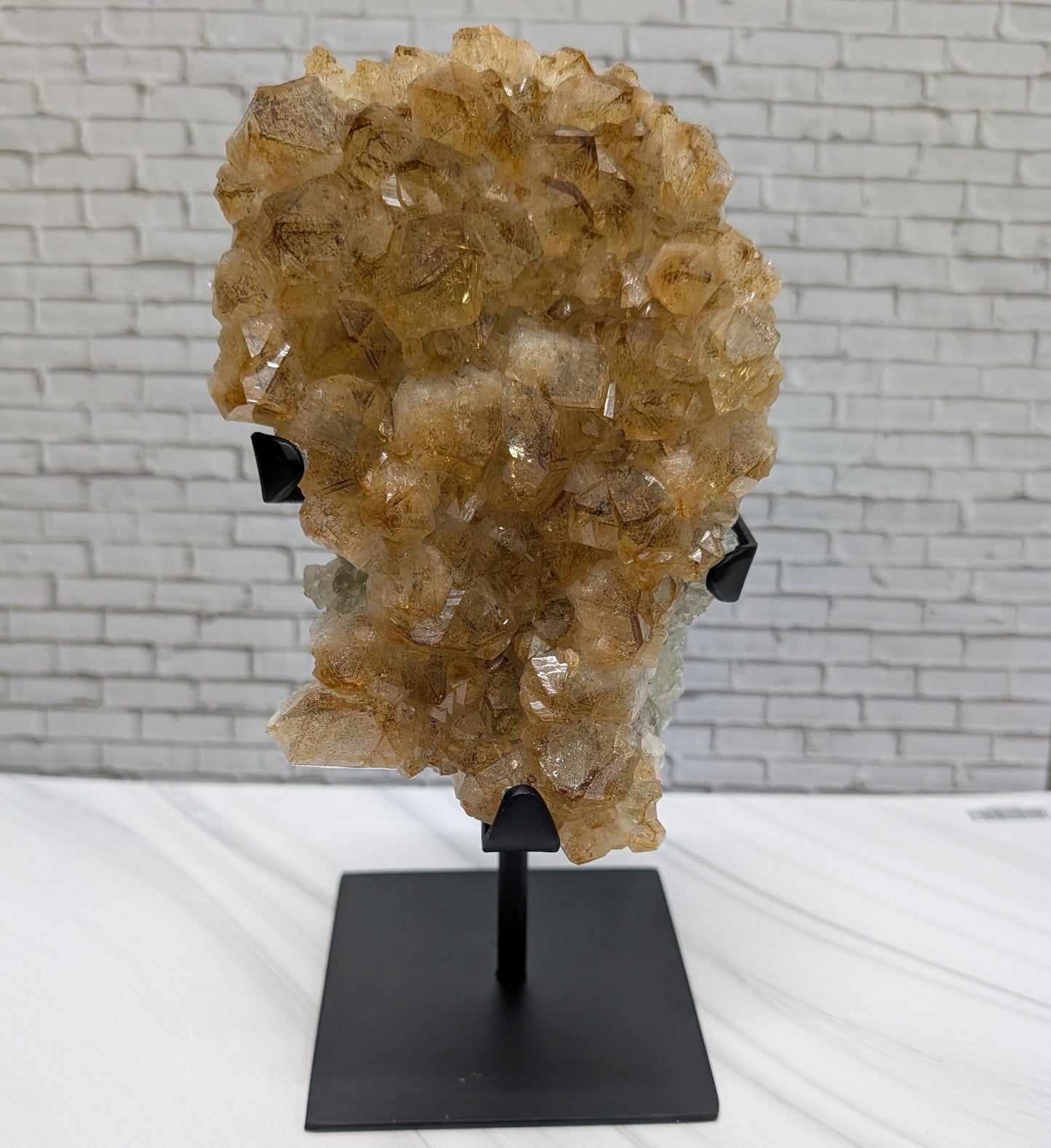 raw citrine on stand