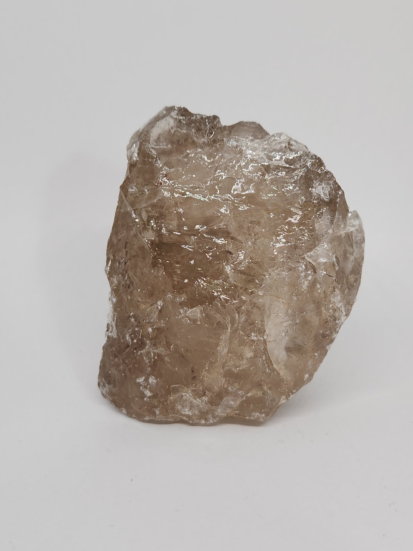 Raw diamond crystal on a white background