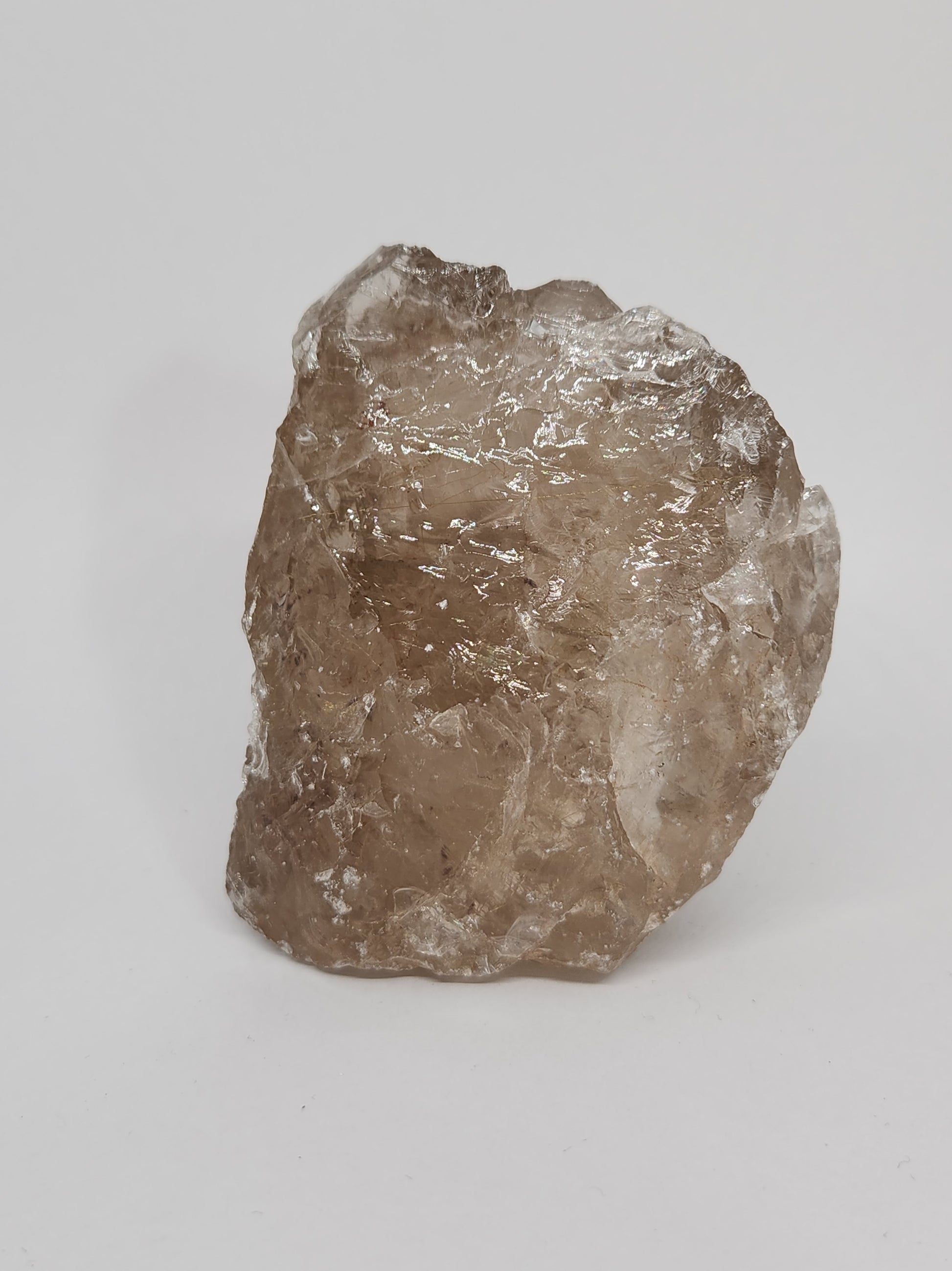 Raw diamond crystal on a white background