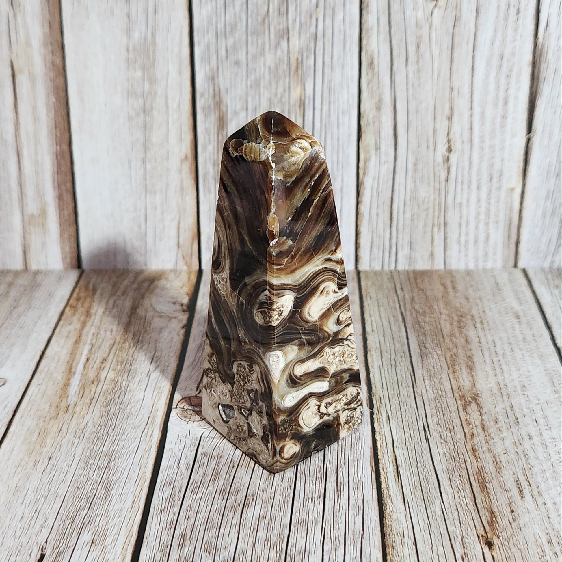 Polished crystal on a wooden surface