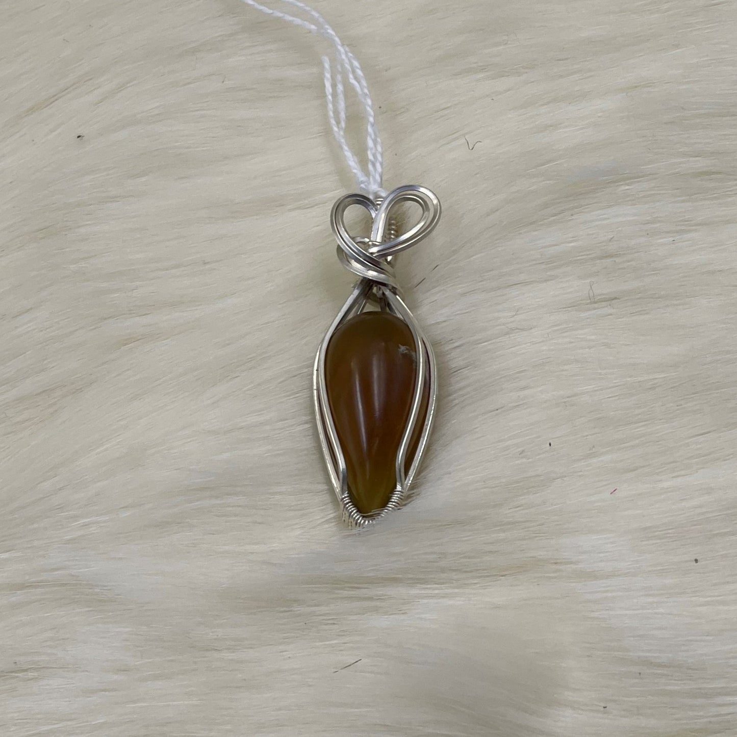 Hand wrapped Sterling Silver Amber Pendant